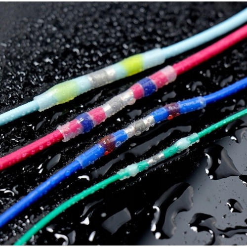 ZŁĄCZKA TERMOKURCZLIWA DOCZOŁOWA TULEJKĄ Z CYNY LUTOWNICZEJ KOSZULKA TTN-15